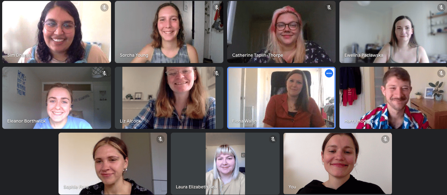 11 members of the Student Hubs team smile at their cameras in a video call.