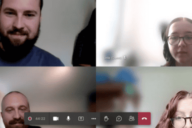 A screenshot of four individuals in a video call