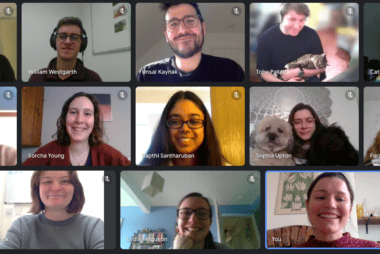 13 members of the Student Hubs staff team smile at the camera in a video call
