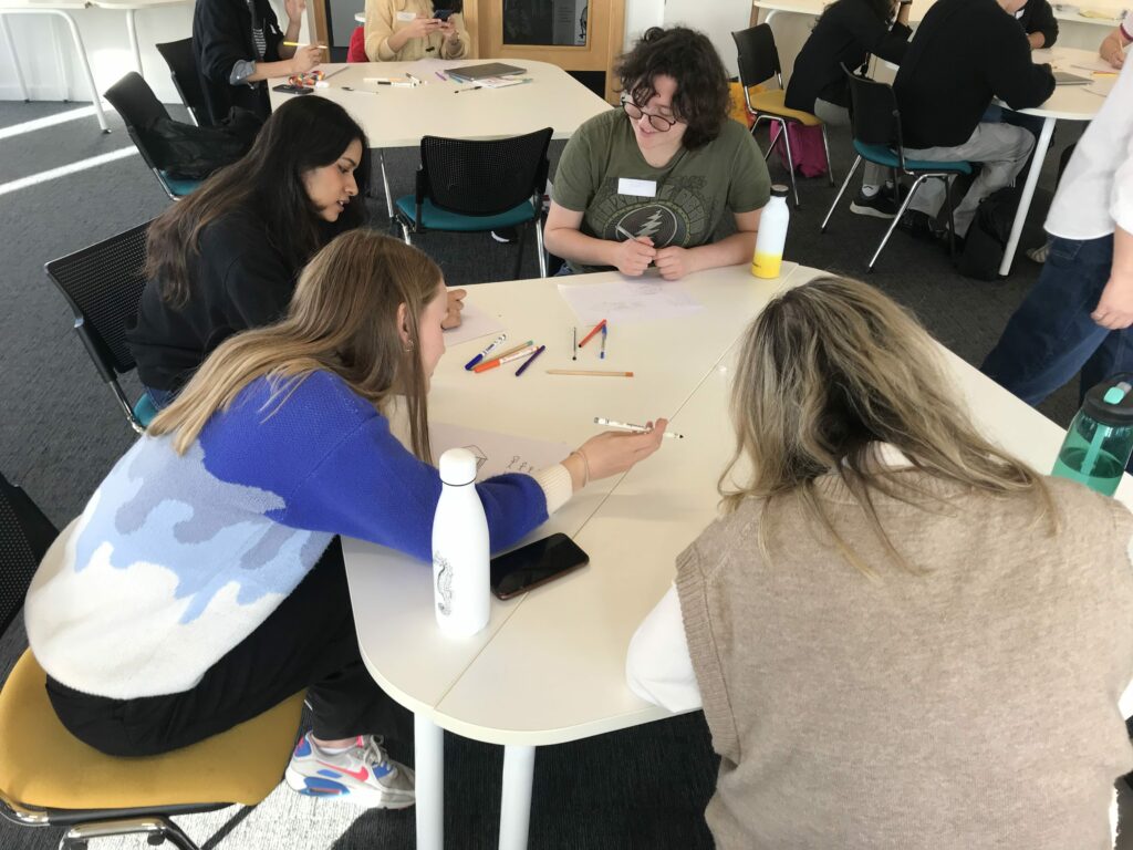 Group of students sitting around a table