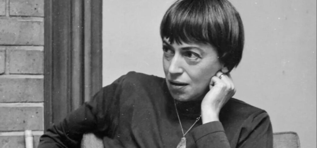 ID: a black and white photo of Ursula K Le Guin